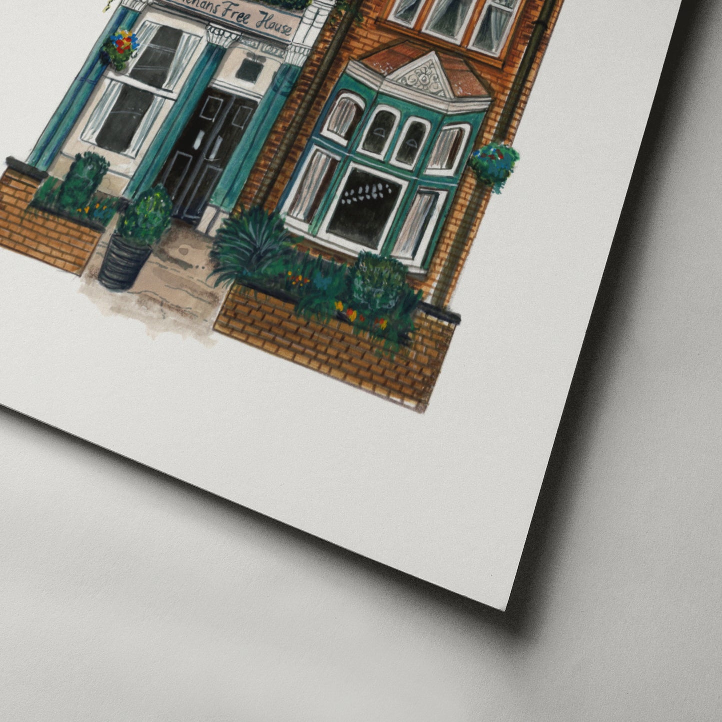 Close-up of of the bottom of Skehans pub art print on white background