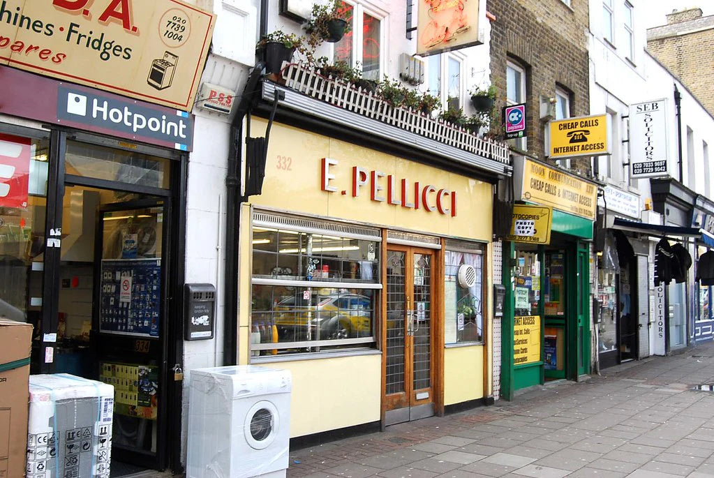 Photo of E.Pellicci cafe amongst other shop fronts nearby